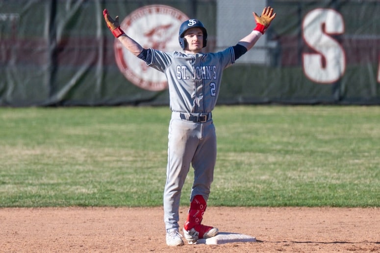 St. John's Prep's Brady Baldassare celebrates his double against St. John's Shrewsbury. (Patrick Donnelly/NEBJ)