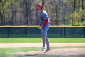 Max Jackson celebrates the final strikeout of Bridgewater-Raynham's win over King Philip. (Patrick Donnelly/NEBJ)